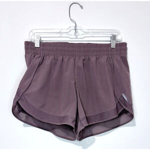 Athleta Mesh Racer Run 4" Short Womens S Mocha Zip Pocket Lined Logo